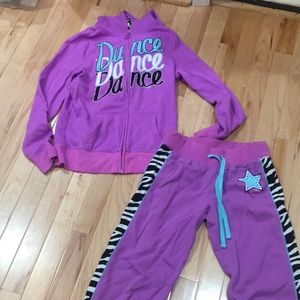 Justice warm up purple.  Girls 10